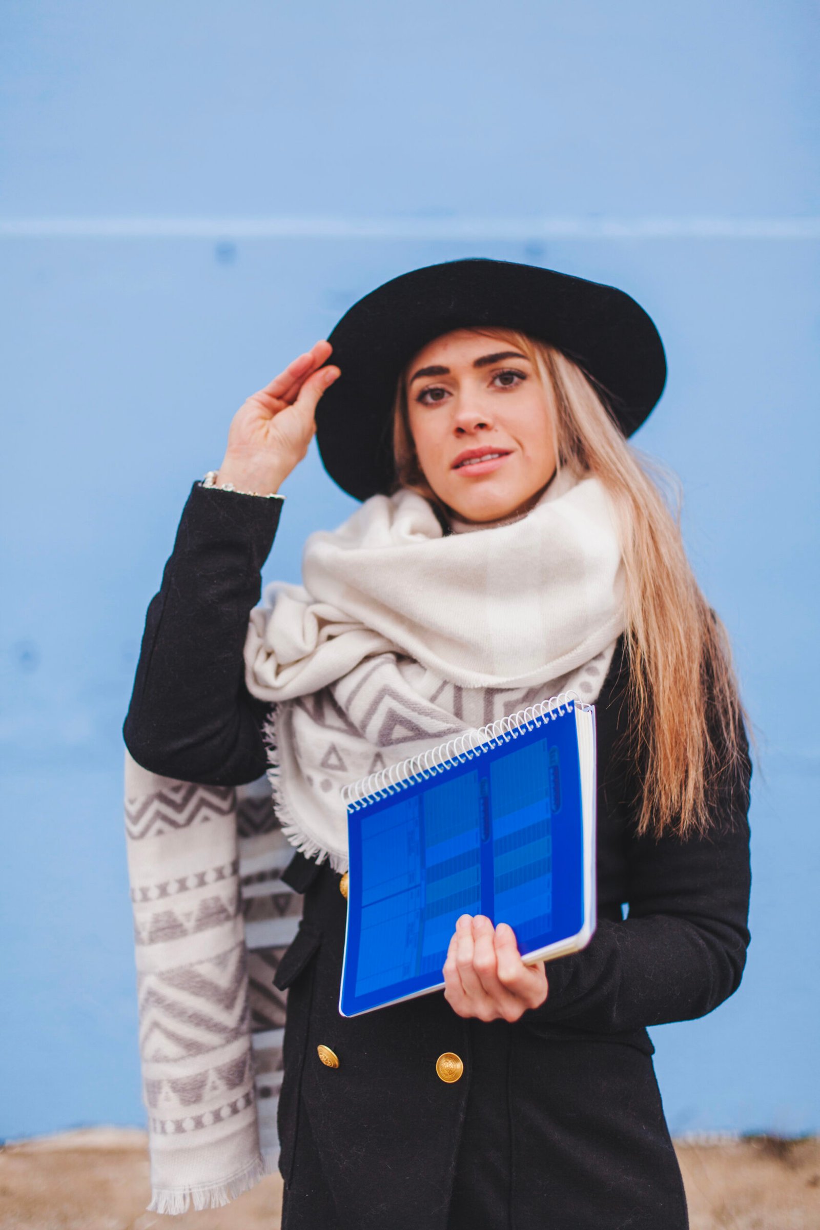 fashionable-woman-with-blue-folder